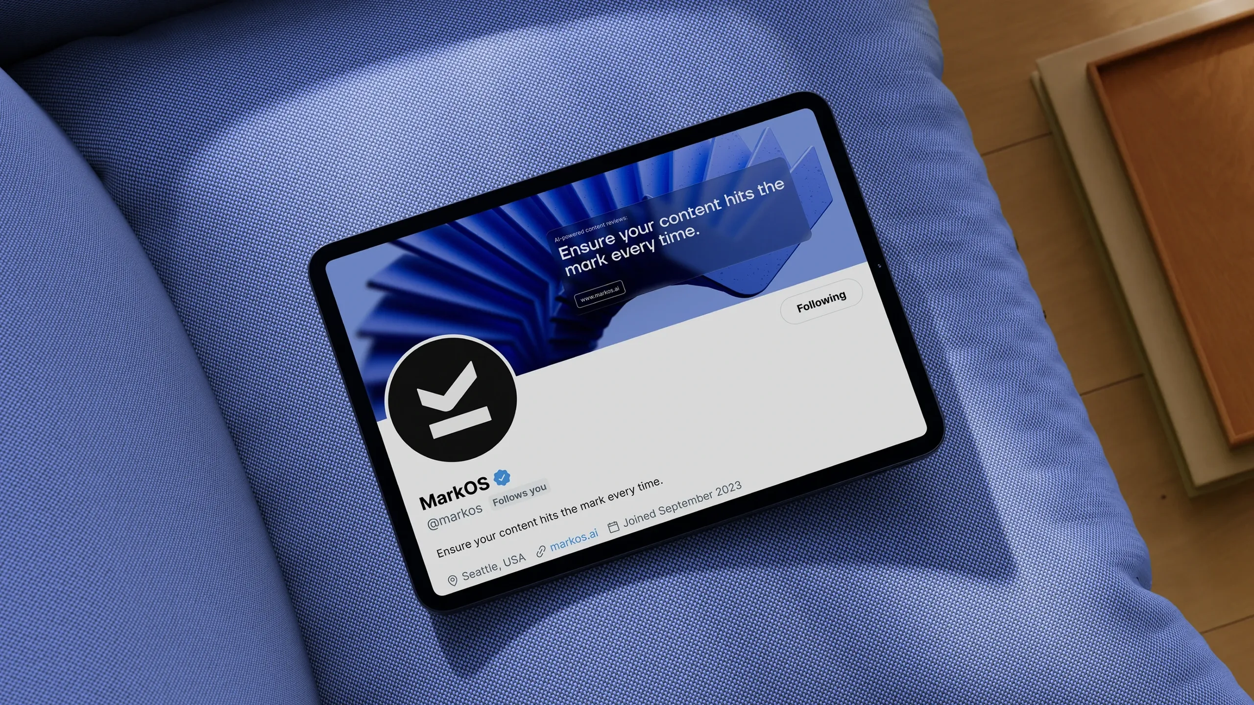  Mark OS social media profile on a tablet showing the brand avatar and cover design.Mark OS social media profile on a tablet showing the brand avatar and cover design. Brand identity by WeGrow.