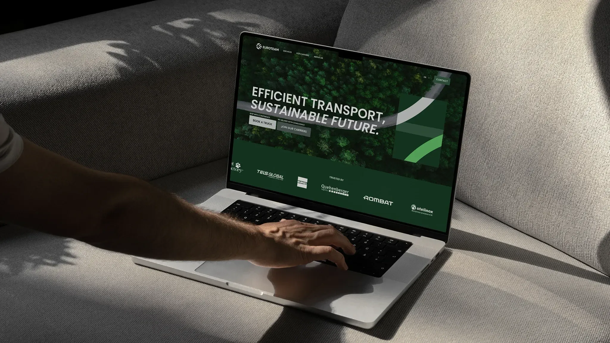 Euroteam website homepage displayed on a laptop showing the logistics brand identity and web design by WeGrow.