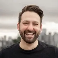 Headshot of Marius Ciocirlan, Co-Founder & CEO at Mark OS and a WeGrow client.