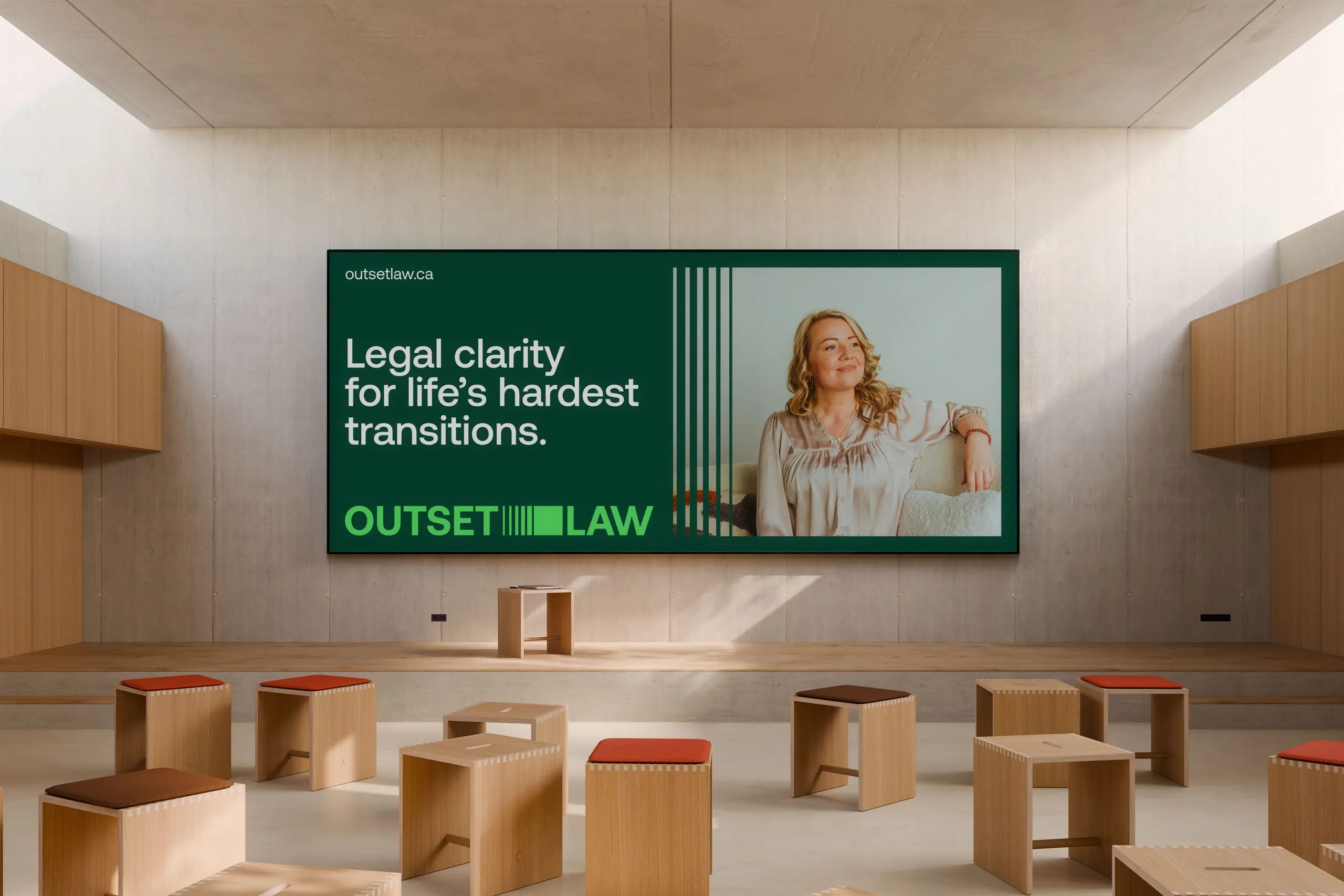 Outset Law brand identity on large indoor screen showing tagline and logo. Vancouver family law firm identity by WeGrow.