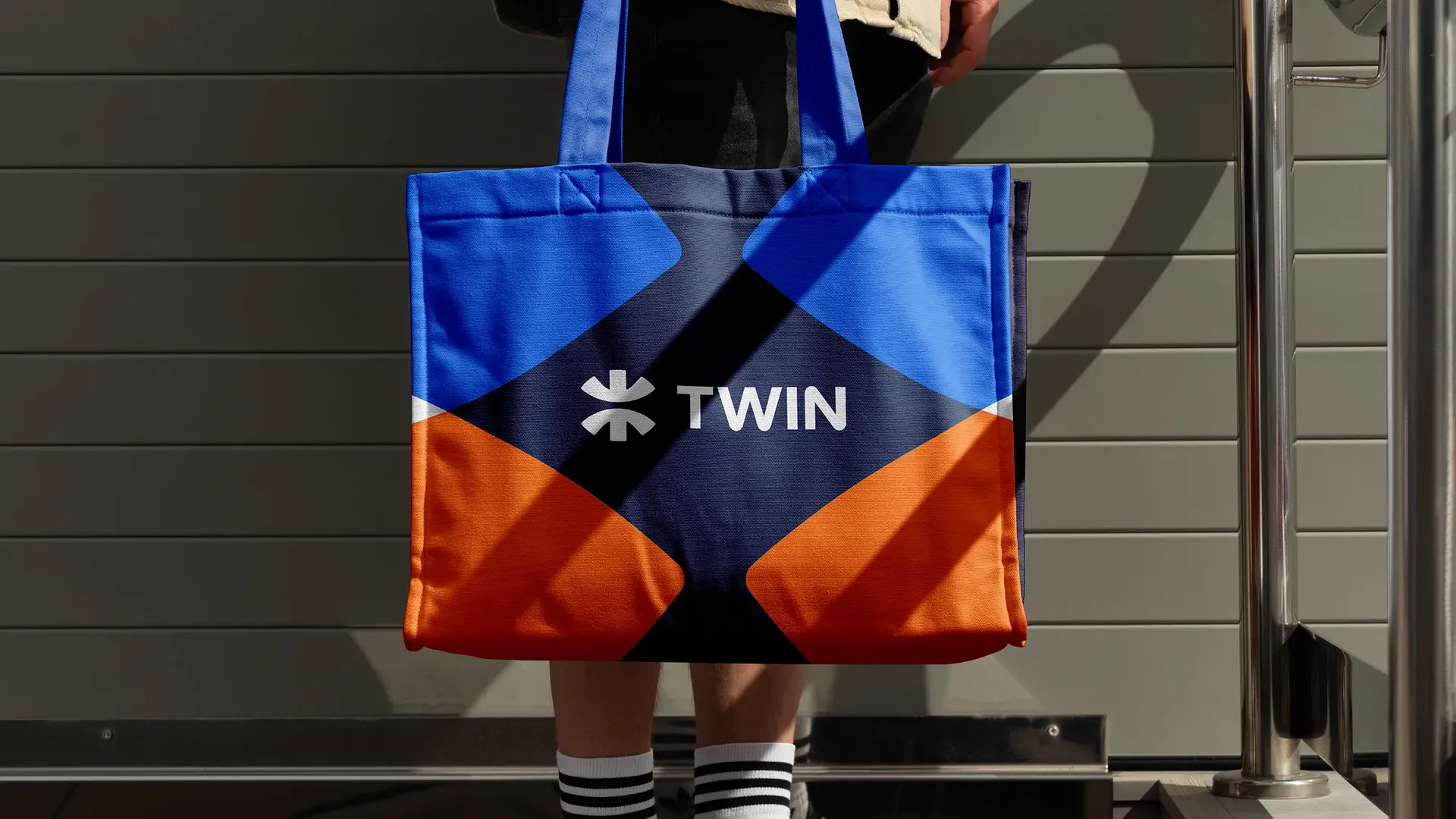 TWIN brand identity on a tote bag. Global digital trade platform brand by WeGrow, built on IOTA blockchain.